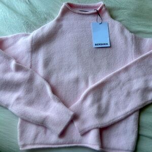 pink turtle neck sweater with tags still on